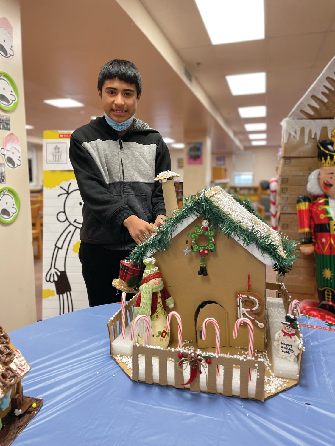 GINGERBREAD STORIES: Ferri students have been asked to build a storybook inspired gingerbread house, using homemade gingerbread, store-bought gingerbread, foam or cardboard for the base. Students can use any kind of materials to decorate the house. Eighth-grader Heber Munoz-Lopez designed a Jan Brett-inspired house.